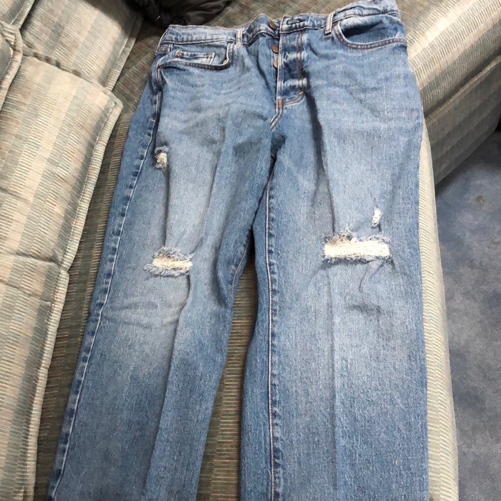 Never worn women’s size 12 distressed jeans